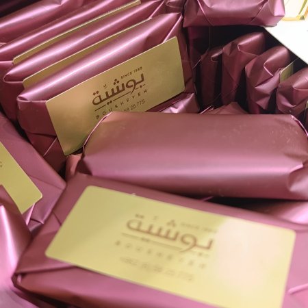 بسكويت لوتس مغطس شوكولاته بالحليب